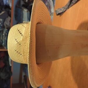 Vintage straw hat with feather.